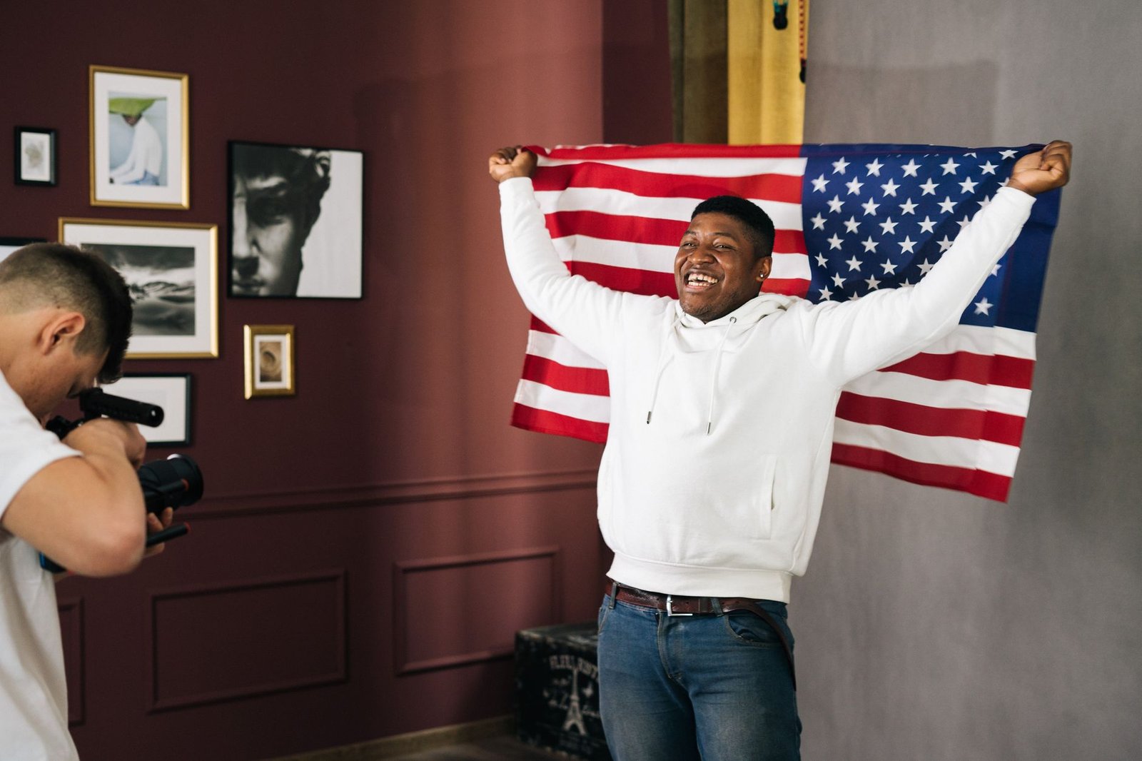 Framed service photo and folded flag in the home of a Coast Guard veteran affected by asbestos exposure