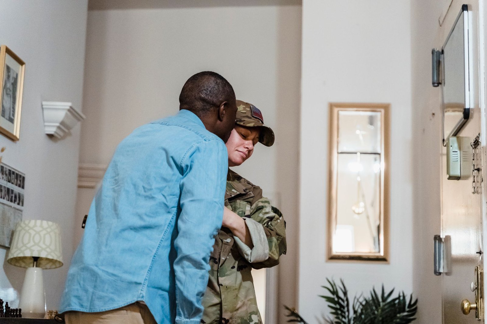 Veteran and spouse at home reviewing VA copay exemption documents together