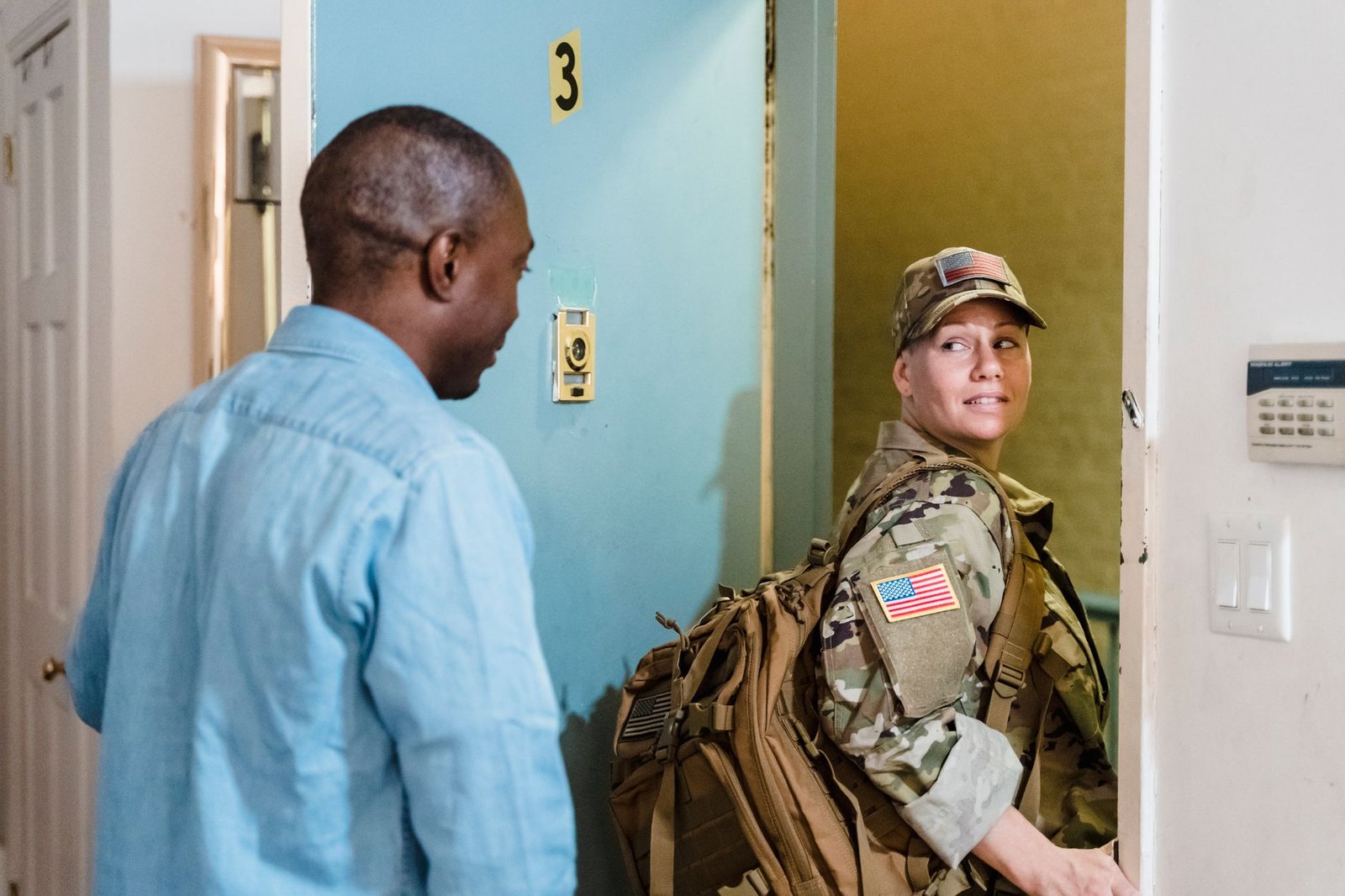Veteran and spouse reviewing clothing allowance paperwork together at home