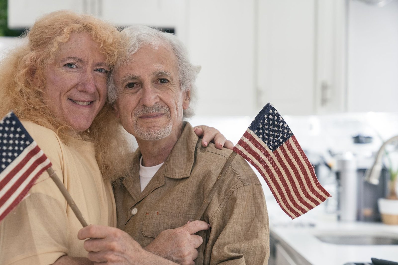 Veteran and spouse reviewing VA effective date documents together at home